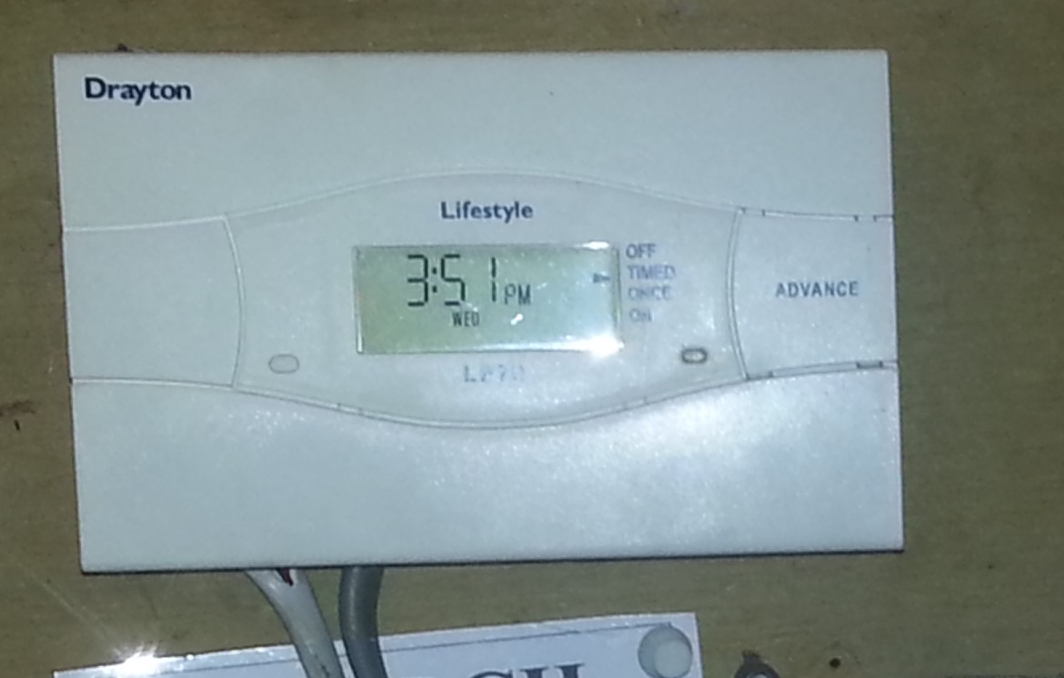 a very inexpensive Drayton Lifestyle heating timeswitch that lacks some useful energy efficiency features for community buildings